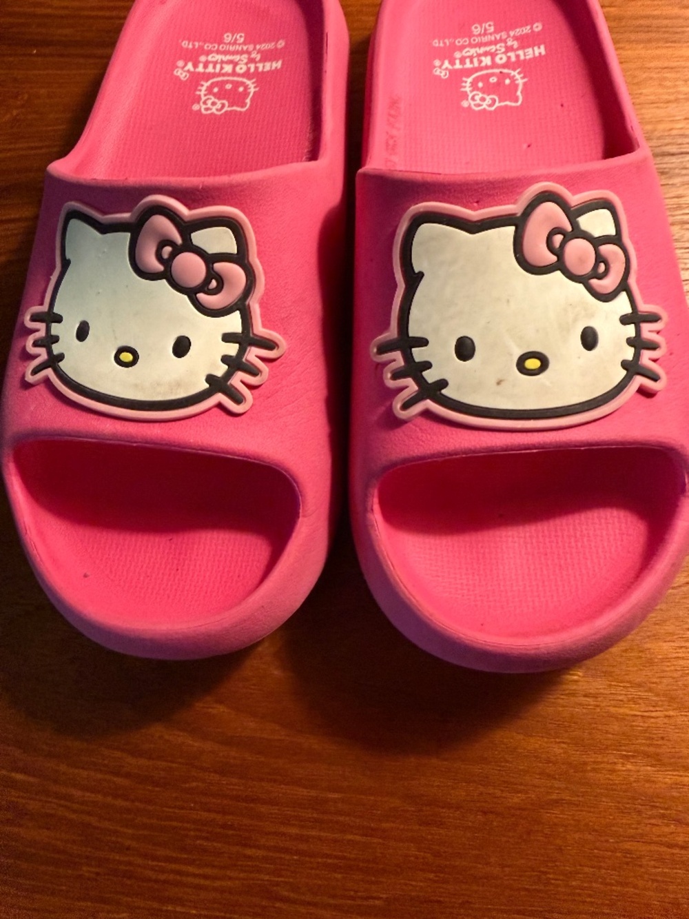 hello kitty pink slip-ons size 5/6